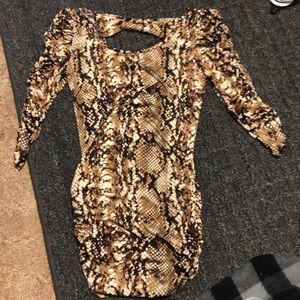 Open back snake print shirt